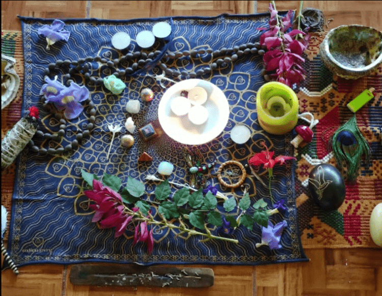 Plant medicine ceremony -lighting incense and candles, setting up altars